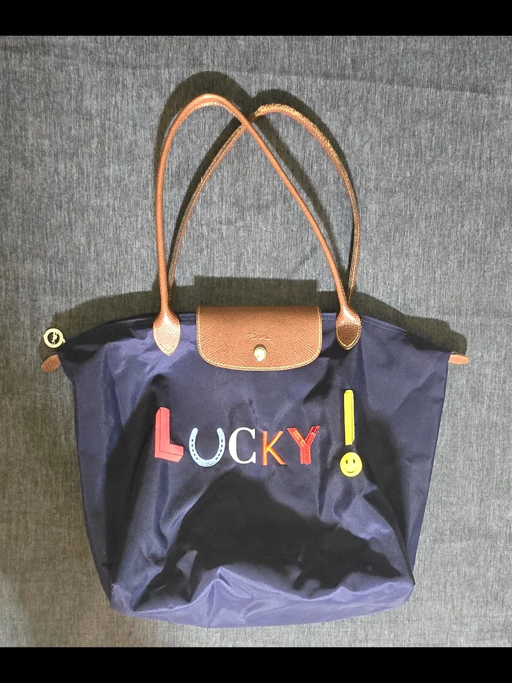 Longchamp Navy Tote with Brown Leather Trim and Colorful 'Lucky' Applique